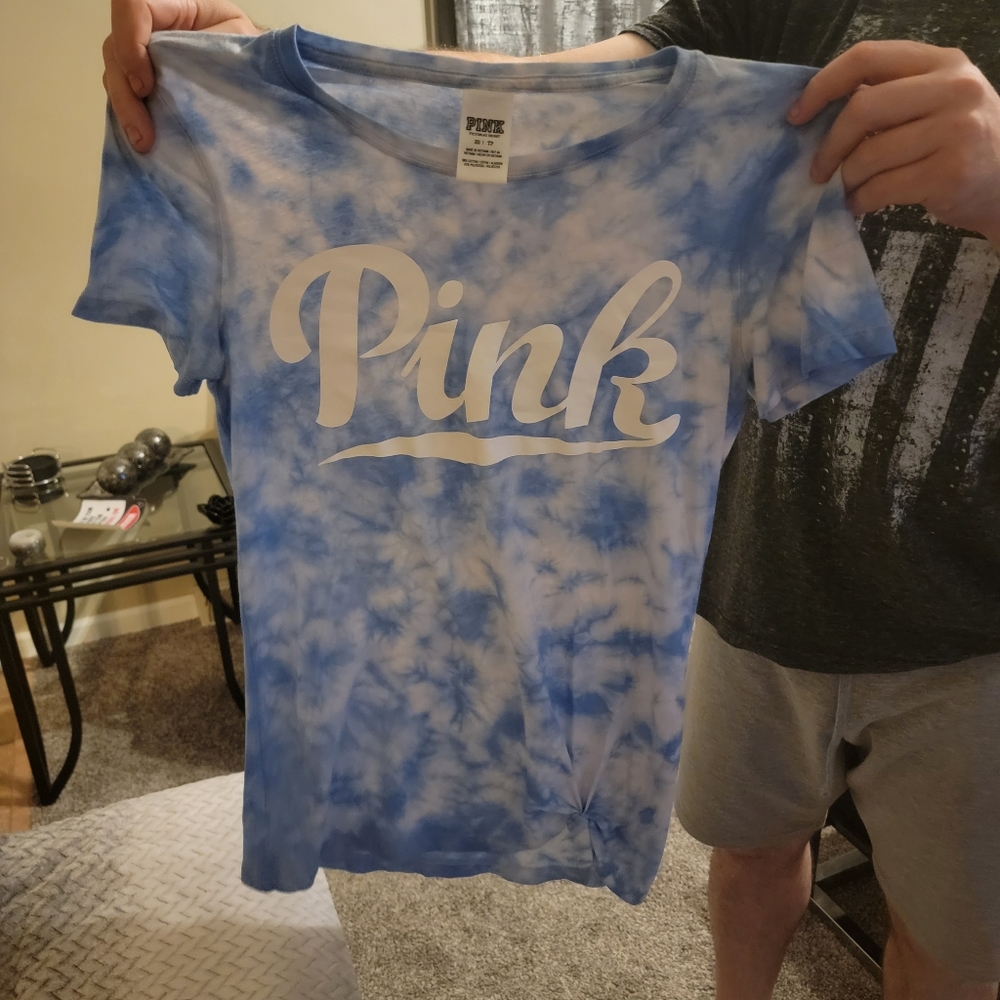 Victoria's secret pink shirt. Says small but I'm a medium and it fits.plus a sex